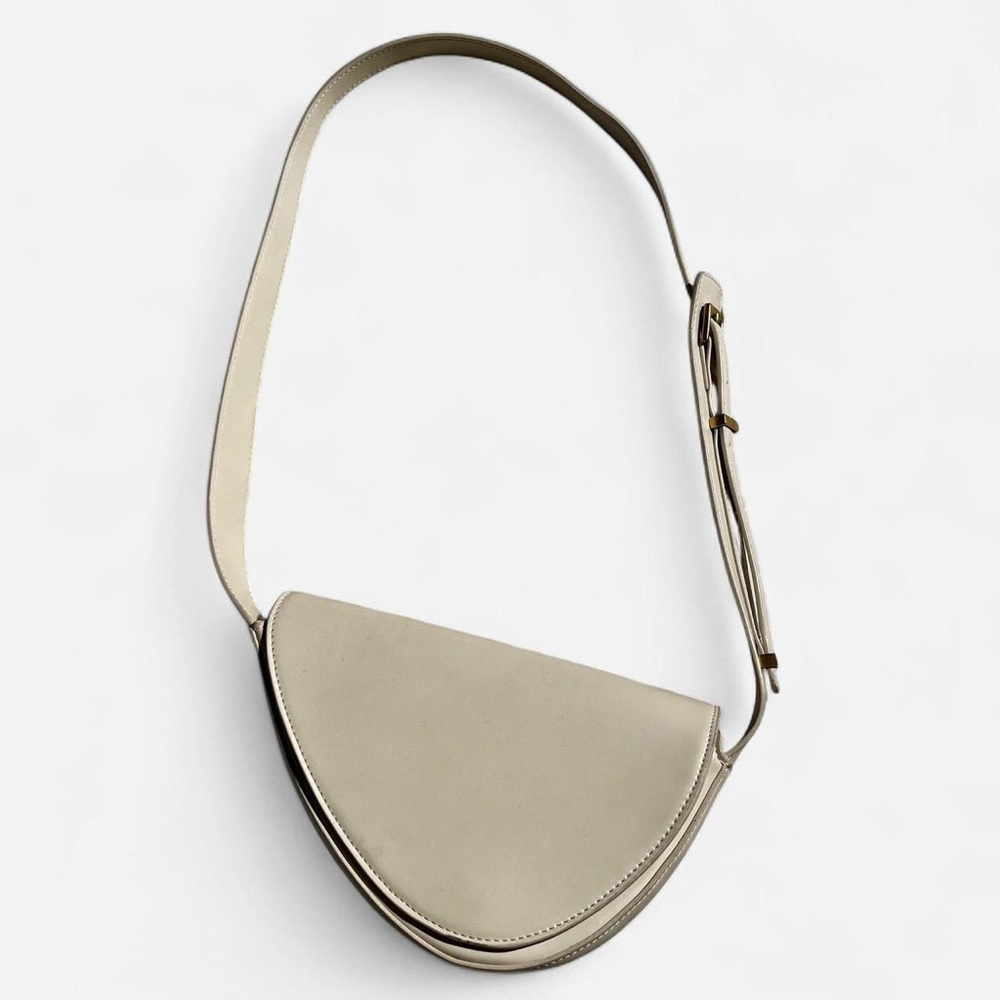 Zara cream asymetrical shoulder bag with gold accents